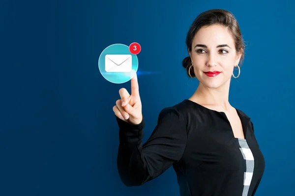 woman touching an email icon